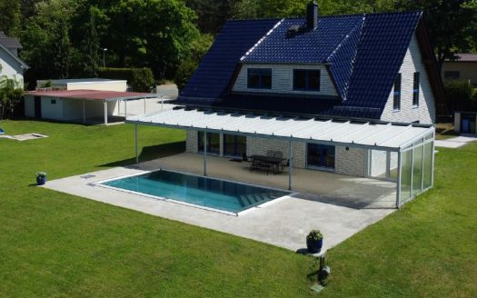 Wohnen am Motzener See / exkl. Villa mit Wassergrundstück, Pool und eigenem Steg